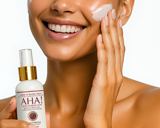 Woman putting on aha sunblock