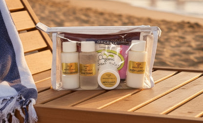 Nonie of Beverly Hills travel kit in a bag on the beach